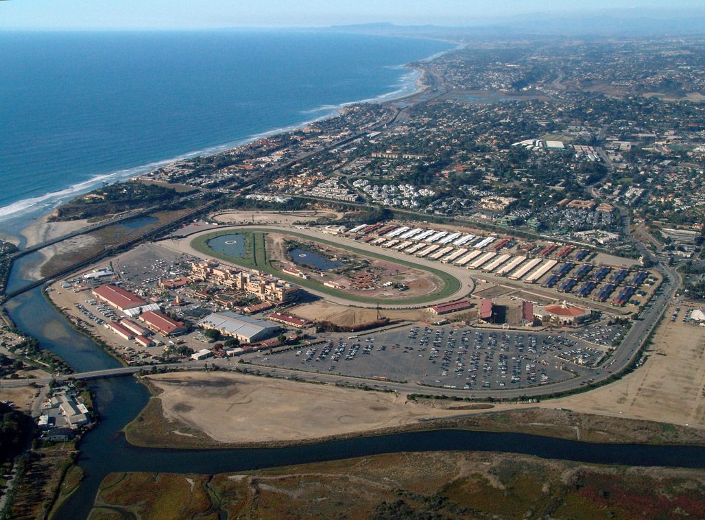 Aerial view of the Del Mar Fairgrounds, racetrack and coastline